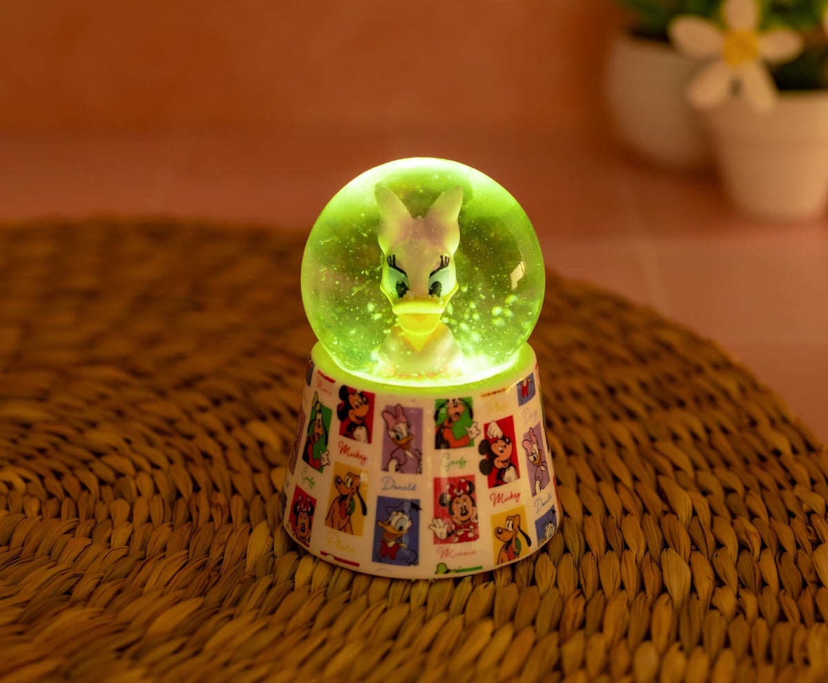 Disney Daisy Duck 3-Inch Mini Light-Up Snow Globe
